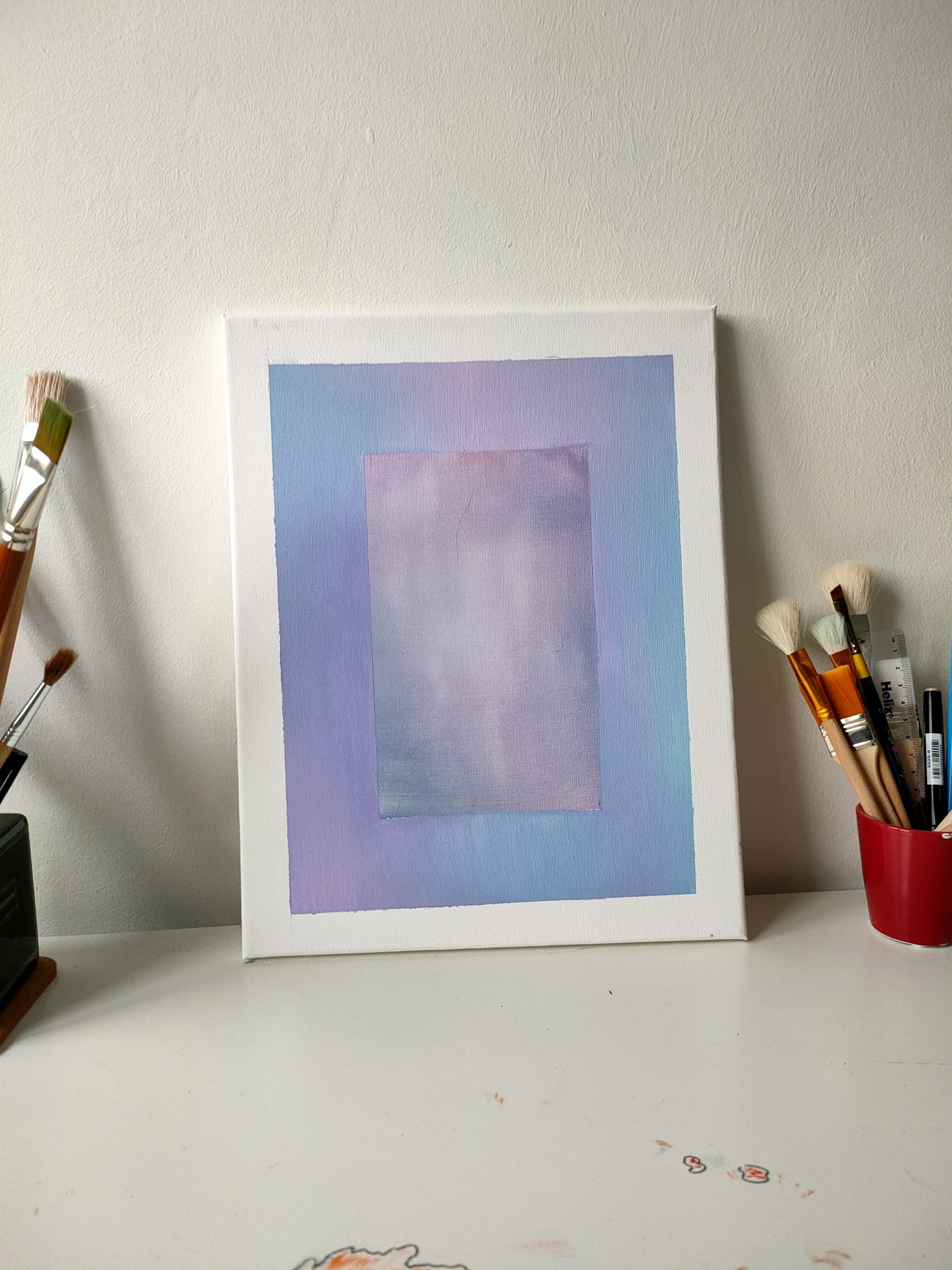 A soft rectangle of lilac and pink on white, in a white frame.